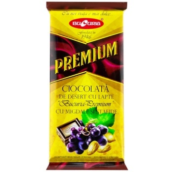 Шоколад молочный Bucuria Premium Миндаль и изюм 90г - купить, цены на BONUS - фото 1